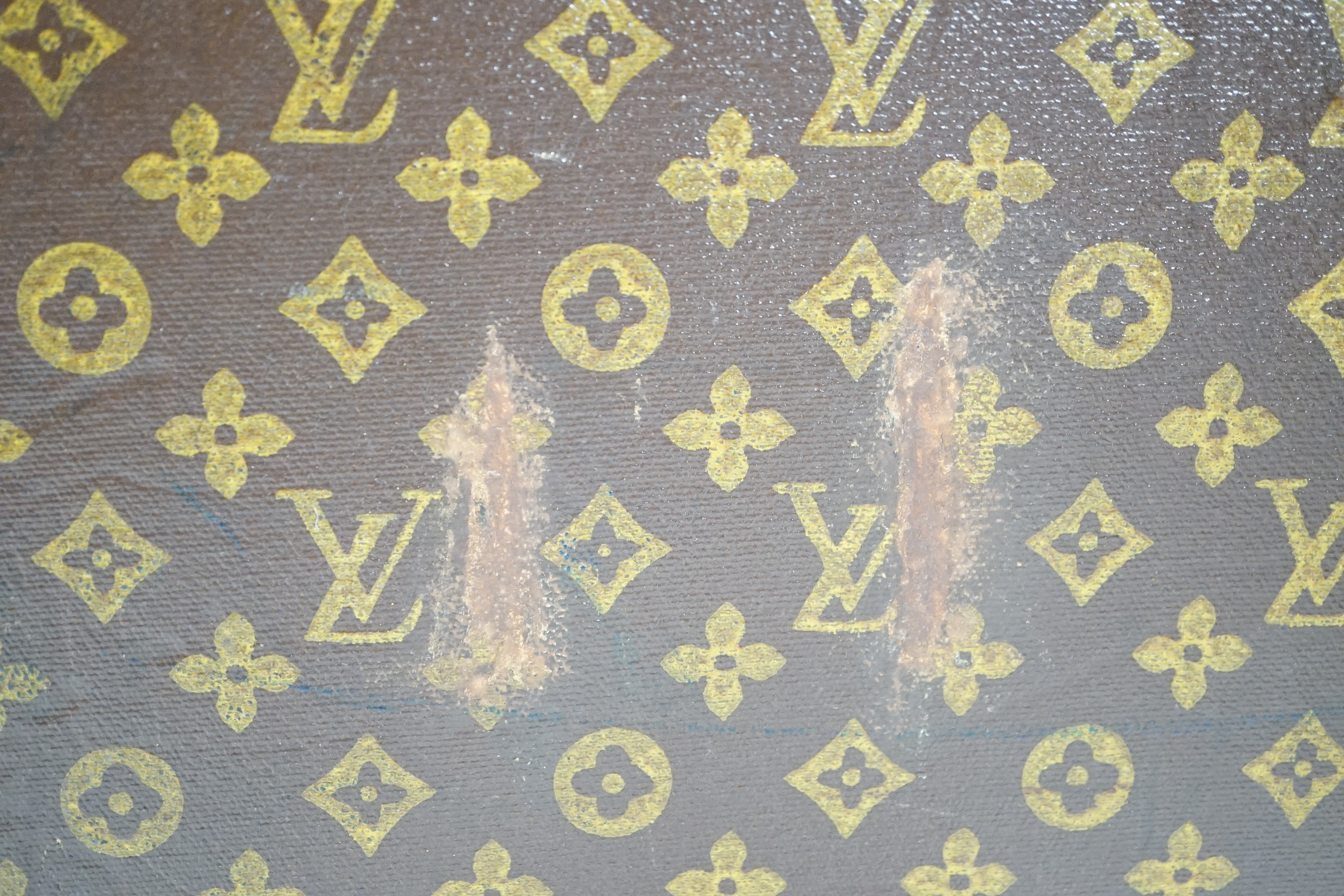 A vintage Louis Vuitton monogram canvas suitcase, 71cm x 44cm x 22cm